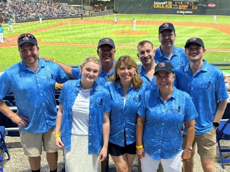 A group of people posing for a photo

AI-generated content may be incorrect.